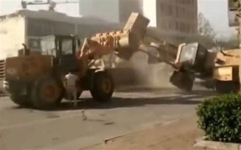 chinese digger fight|Bulldozer Fight in China .